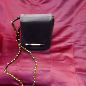 Black shoulder strap purse